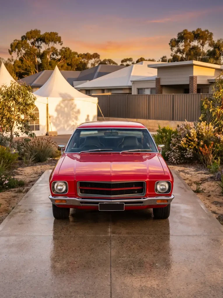 Editorial car show event photography of a red muscle car at golden hour in Perth, WA